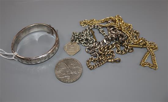 A modern silver identity bracelet, a modern silver bangle, three gilt alberts and a commemorative coin.